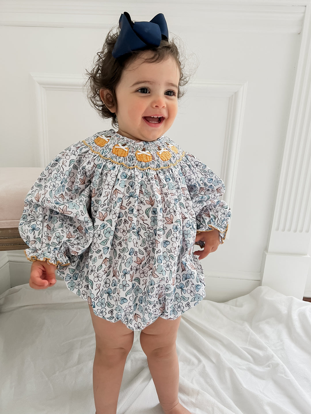 Colette Blue Floral And Pumpkin Smocked Bubble