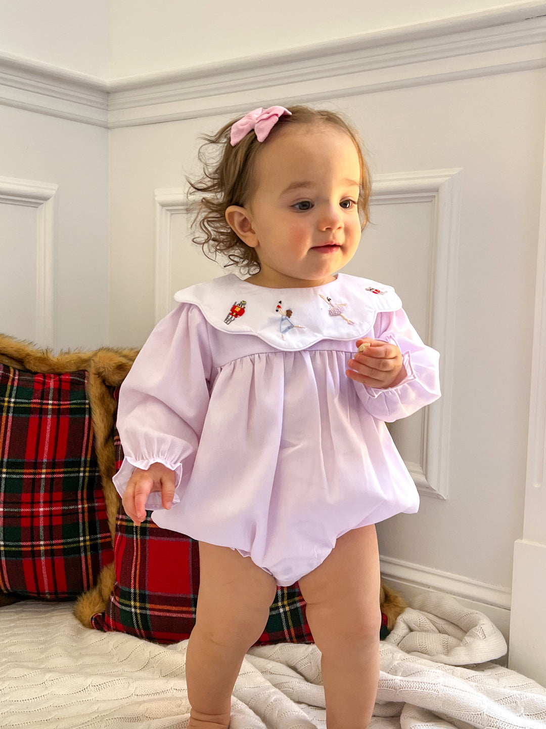 nutcracker smocked dress Character Embroidered Long Sleeve in size 12M The dress is made of baby blue cotton fabric and has a white rickrack accent along the bottom hem and the sleeve edges Anavini Girls Pink Corduroy Smocked