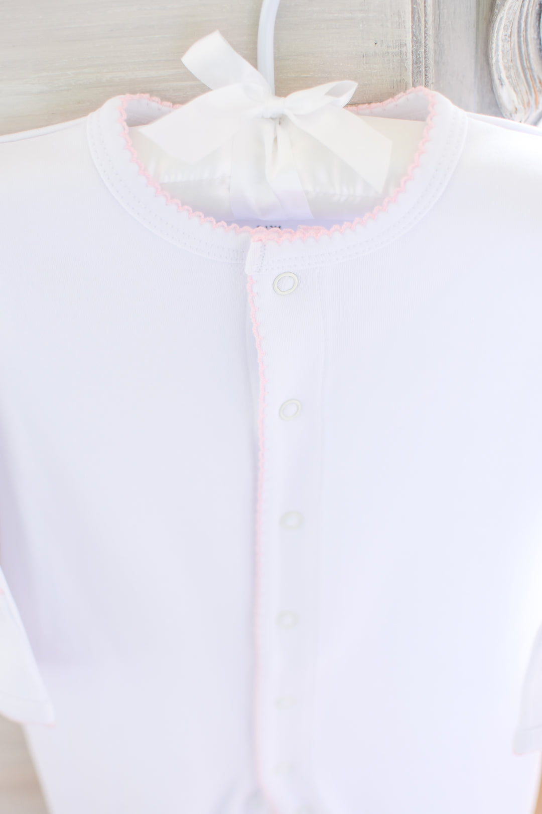 White Baby Girl Footie with Pink Trim
