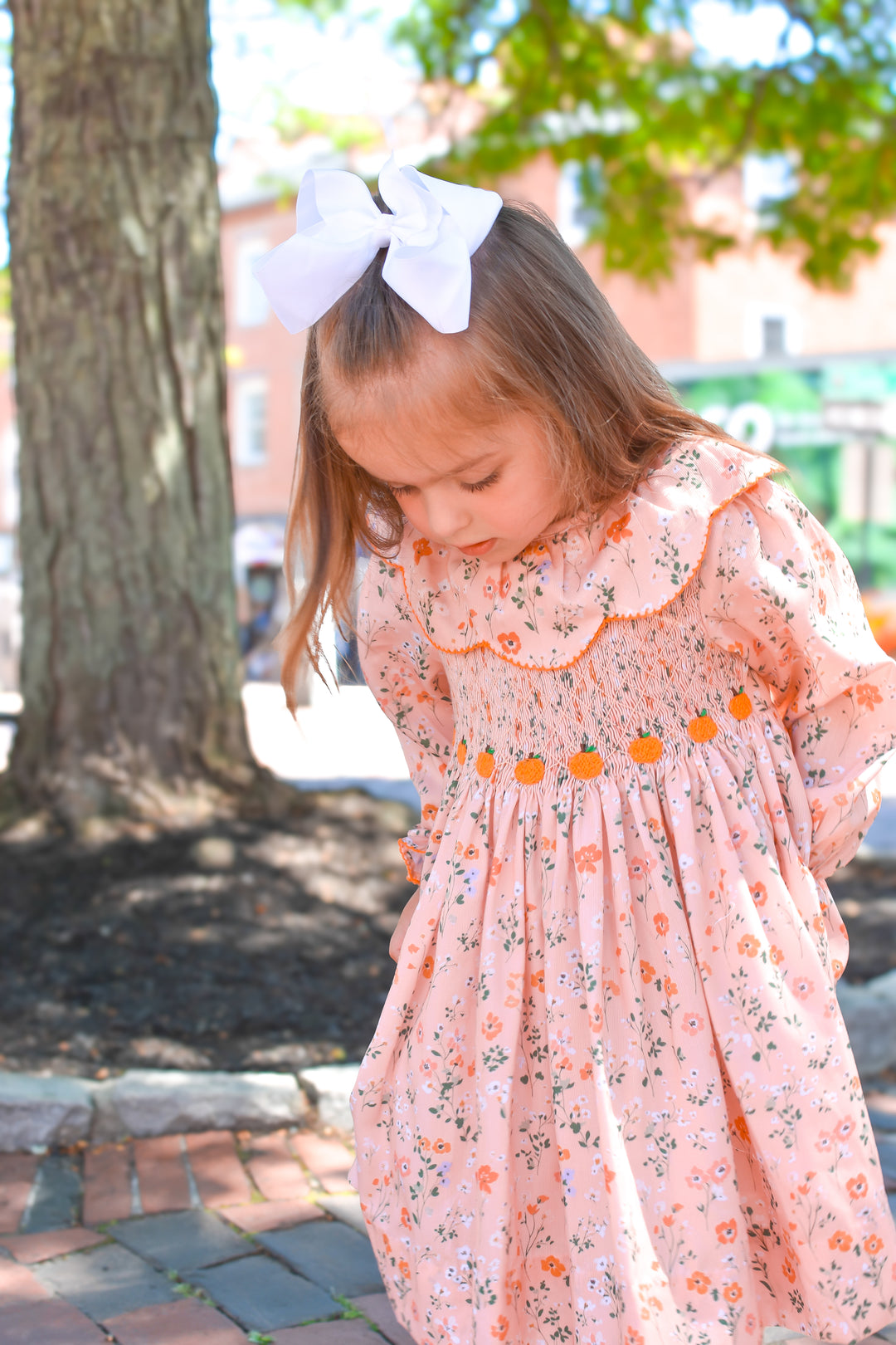 PRE-ORDER Peach Floral Pumpkin Smocked Dress