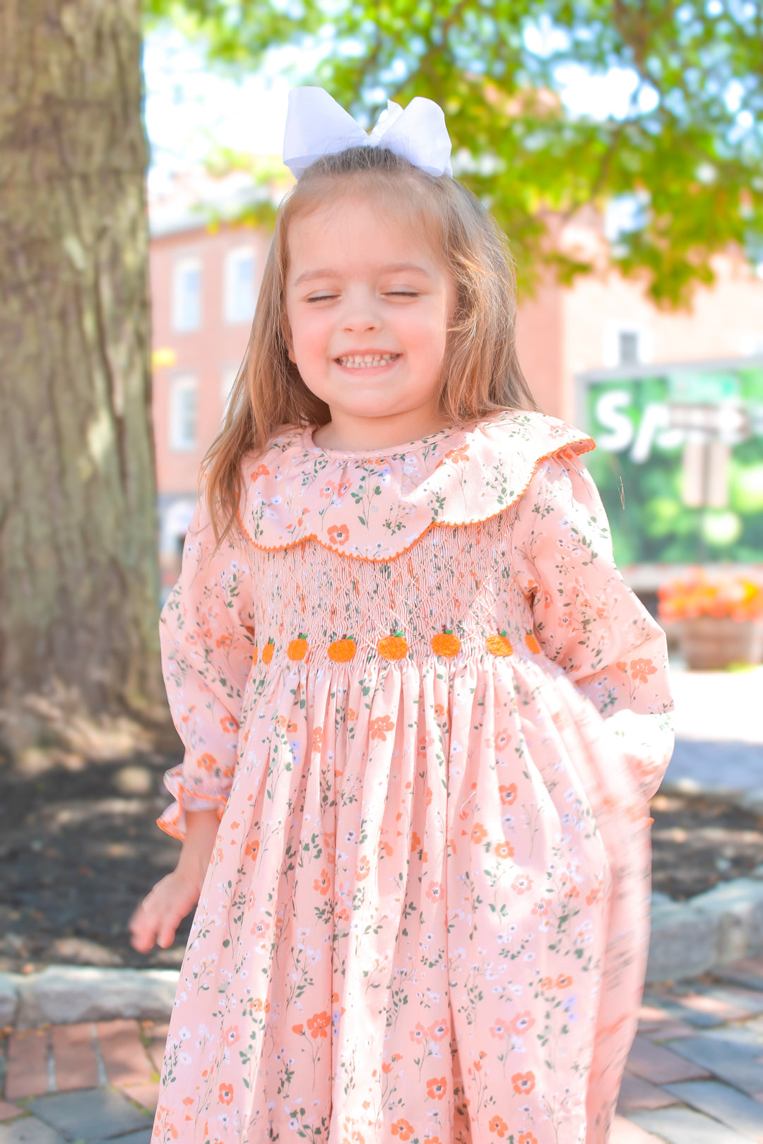 PRE-ORDER Peach Floral Pumpkin Smocked Dress