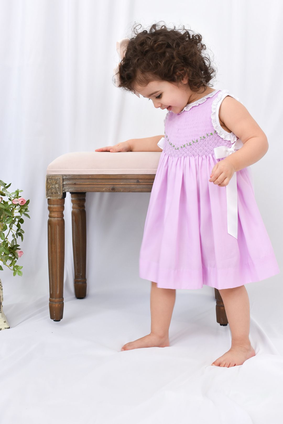 Roses on Purple Smocked Dress with Satin White Bows