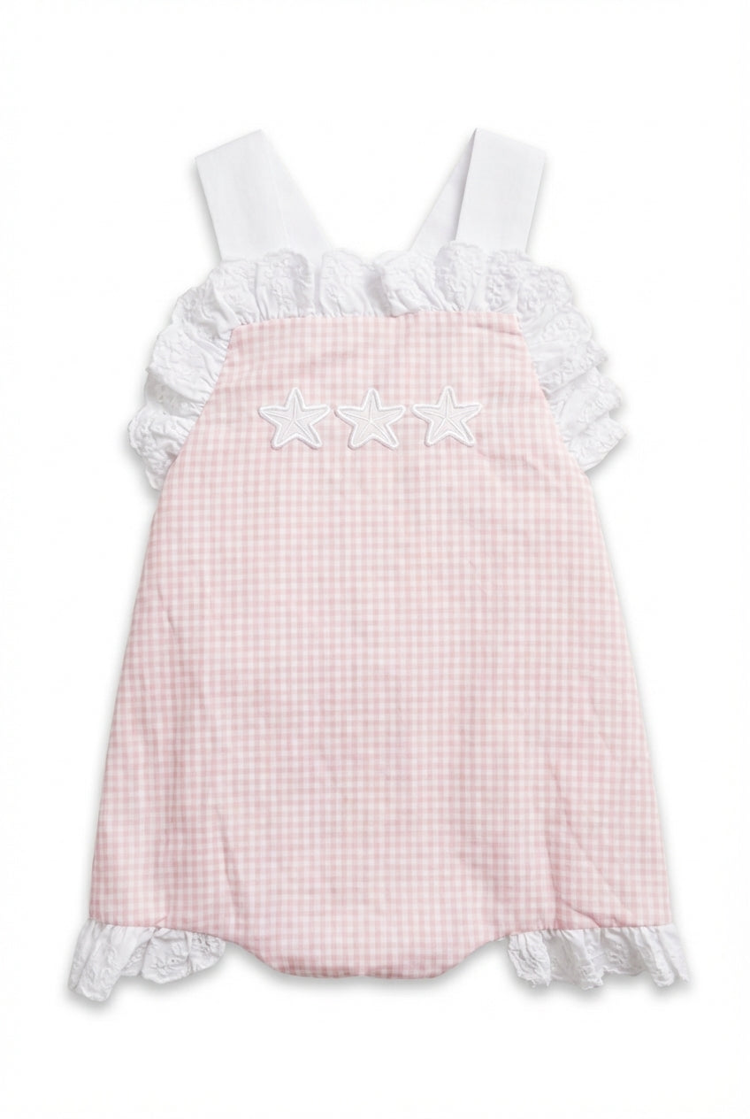 Pink girls dress with white ruffles and starfish detail