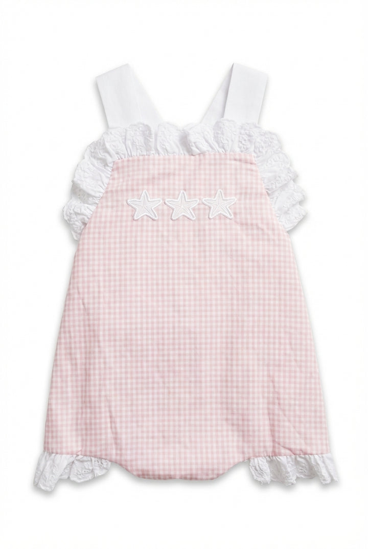 Pink girls dress with white ruffles and starfish detail