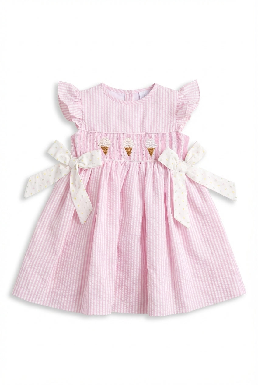 Pink smocked girls dress with ice cream embroidery and bows
