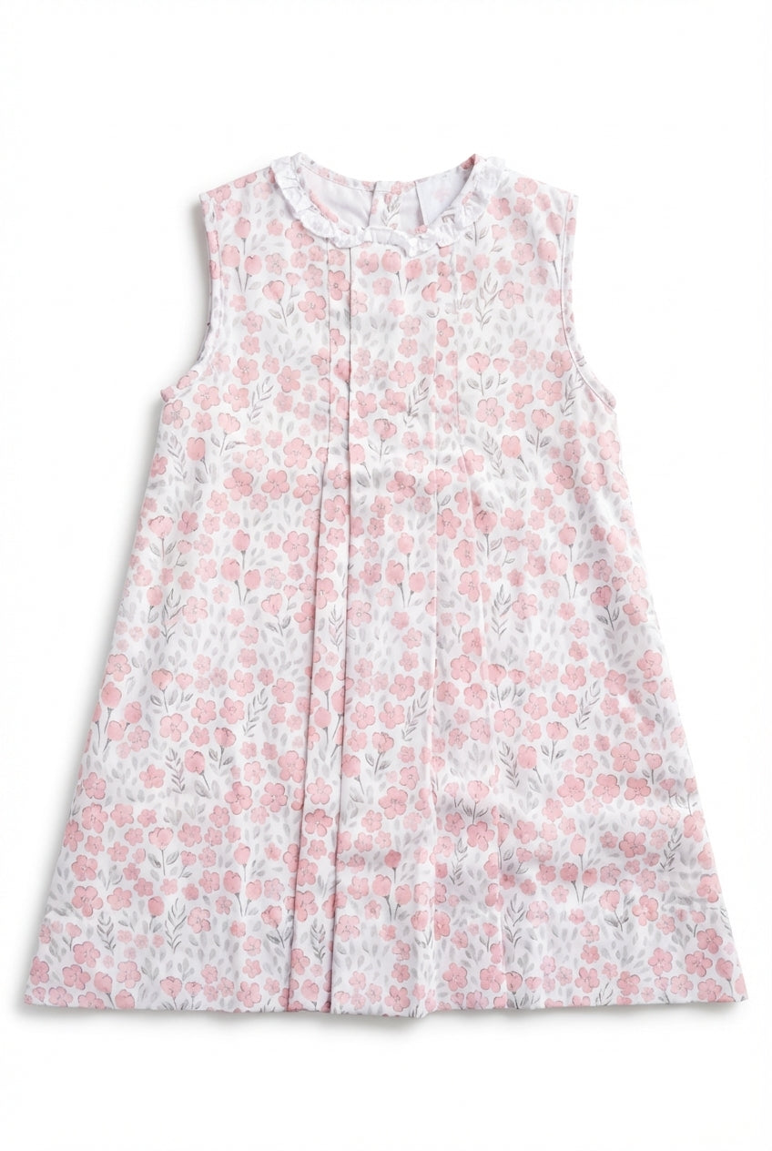 Girls pink floral dress with sleeveless silhouette and ruffle neck