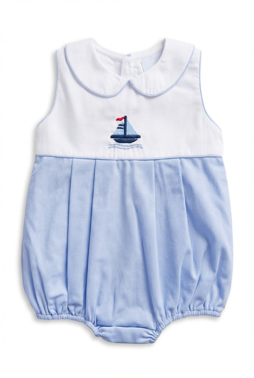 Blue baby boy bubble with white bodice and sailboat embroidery