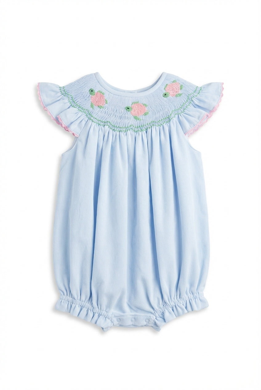 Blue smocked bubble for baby girl with pink turtles