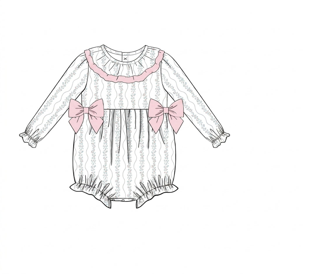 White baby bubble with blush bows and ruffle yoke