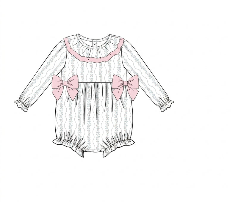White baby bubble with blush bows and ruffle yoke