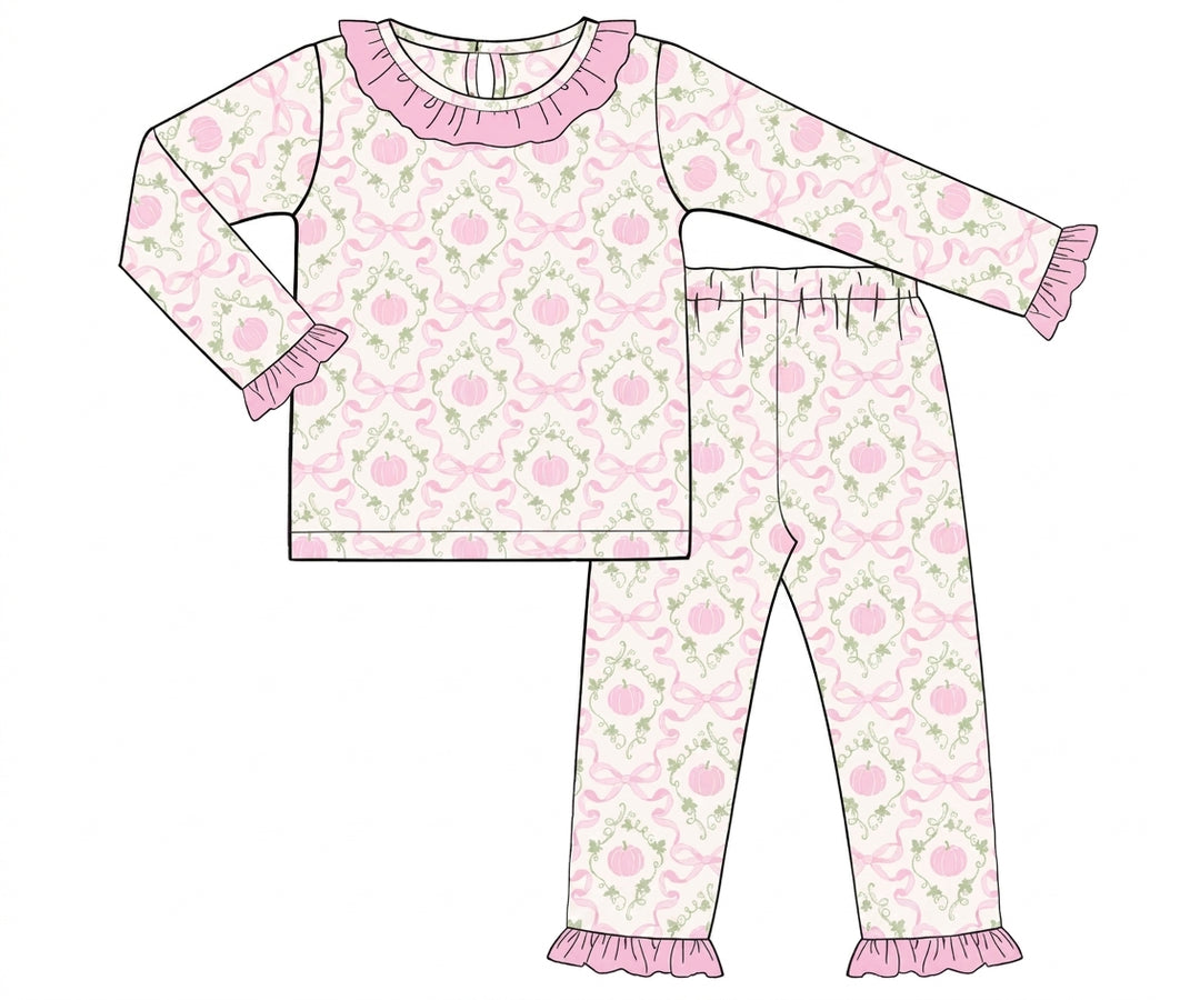 White knit pajamas with pink pumpkin vine print and ruffles