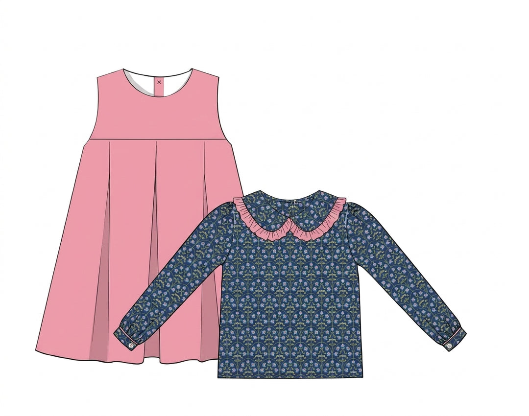 pink pinafore dress with navy floral ruffle blouse